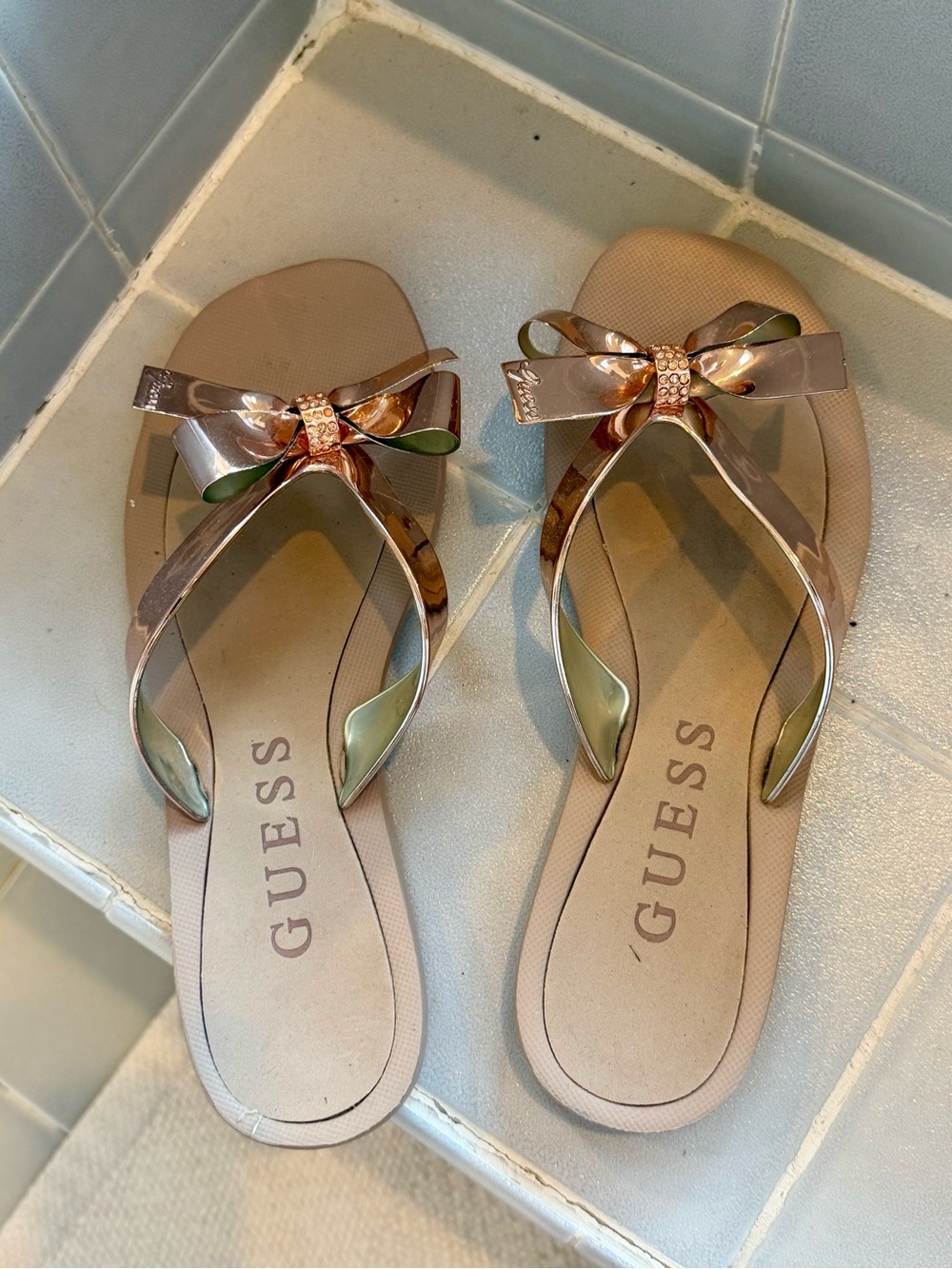 GUESS Metallic Rose Gold Bow Sandals